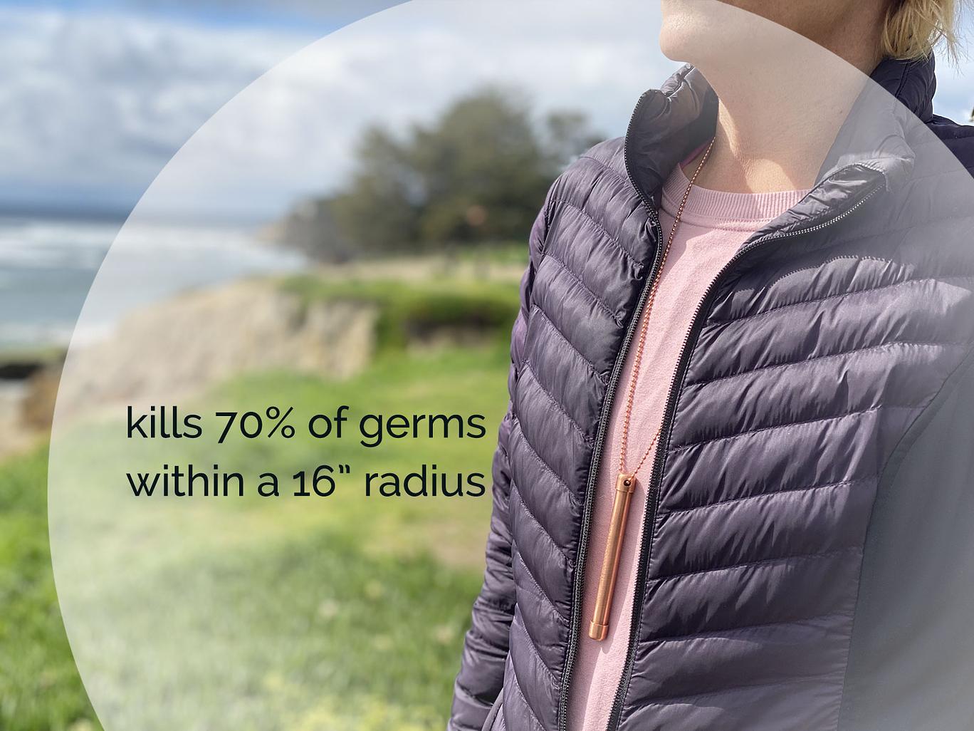 Shows user wearing One 4" Magic Wand Halo Necklace on 30" copper beaded ballchain necklace. Necklace is lacquered so will not turn neck green. Says kills 70% of germs witin a 16" radius. Made in USA from natural antimicrobial copper. Roll between hands to kill 99.97% of bacteria, virus, and germs. All Natural Hand Sanitizers, Chemical Free, Lasts Forever. Will not chap hands or make sore. Recyclable. EPA registered. Patented