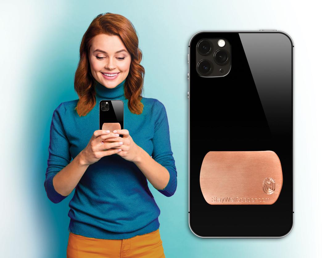 Lady holding phone case with 2" x 1.5" Adhesive Phone Patch made in USA from natural antimicrobial copper attaches to germy devices we touch most. Phone case with phone patch shown. Sanitizers, Chemical Free, Lasts Forever. Recyclable. Kills 99.9% of Harmful Bacteria. EPA registered. 